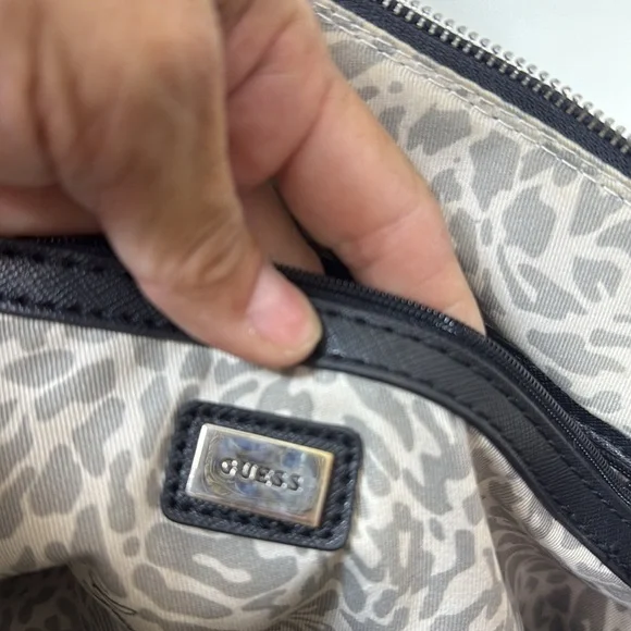 (E) Guess Bag
Black and Silver Crossbody and Shoulder Bag - Picture 12 of 15